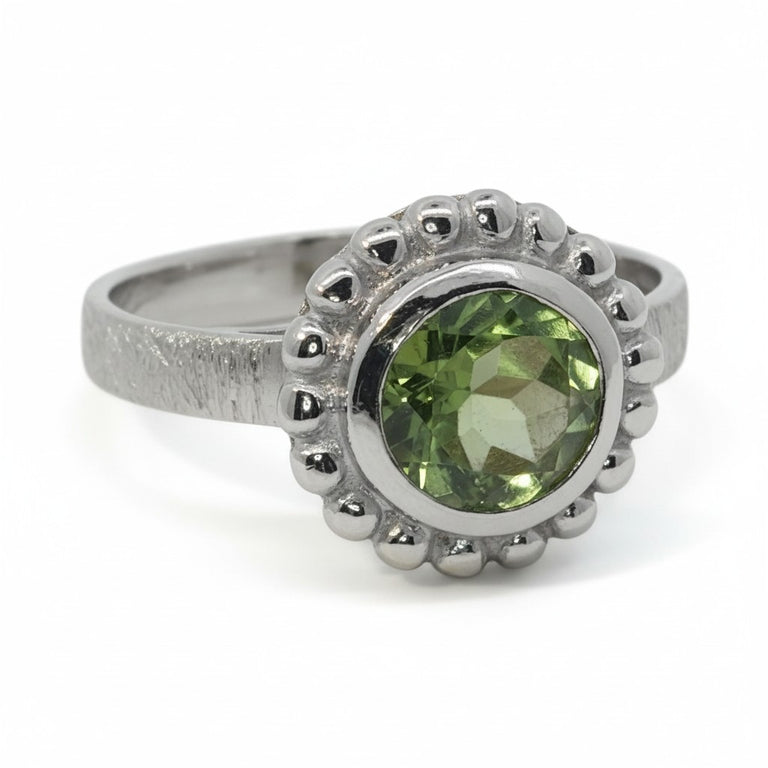 Ring Orbis mit Peridot