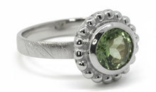 Ring Orbis mit Peridot