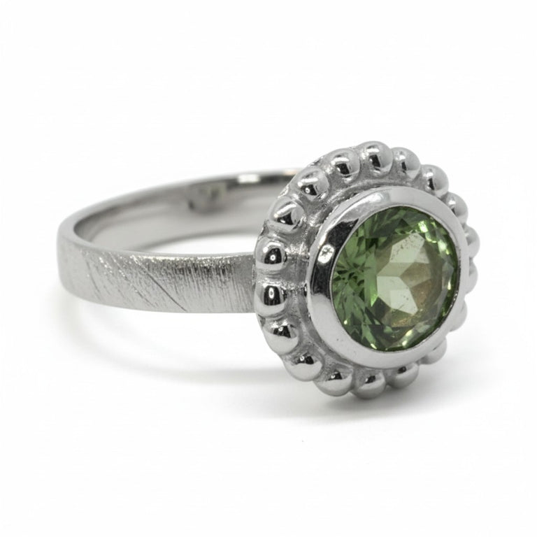 Ring Orbis mit Peridot