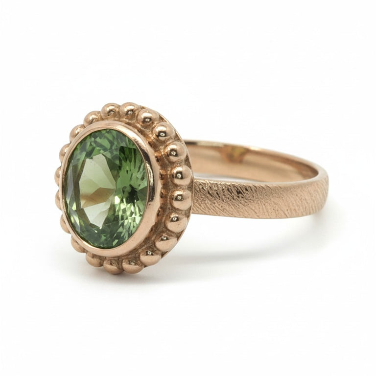 Ring Orbis mit Peridot