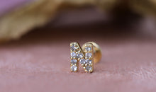 Piercing BUCHSTABEN